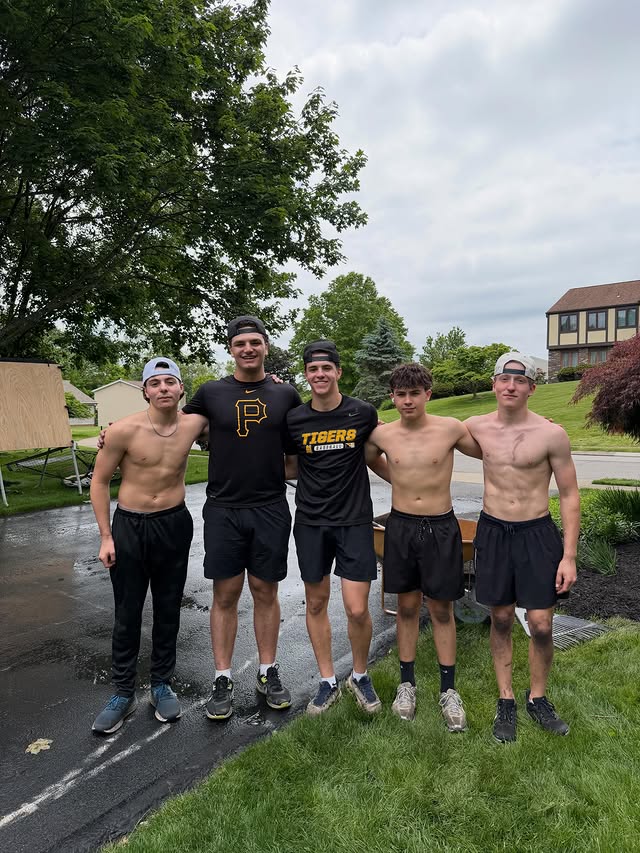 Jacobs Landscaping crew after finishing a rainy-day landscaping job